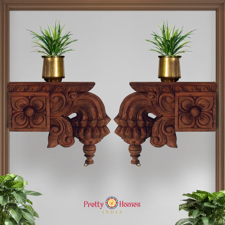 Traditional handcarved wooden wall bracket featuring carved lotus base design