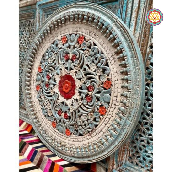 Side angle of floral jali wooden panel showing depth and detail