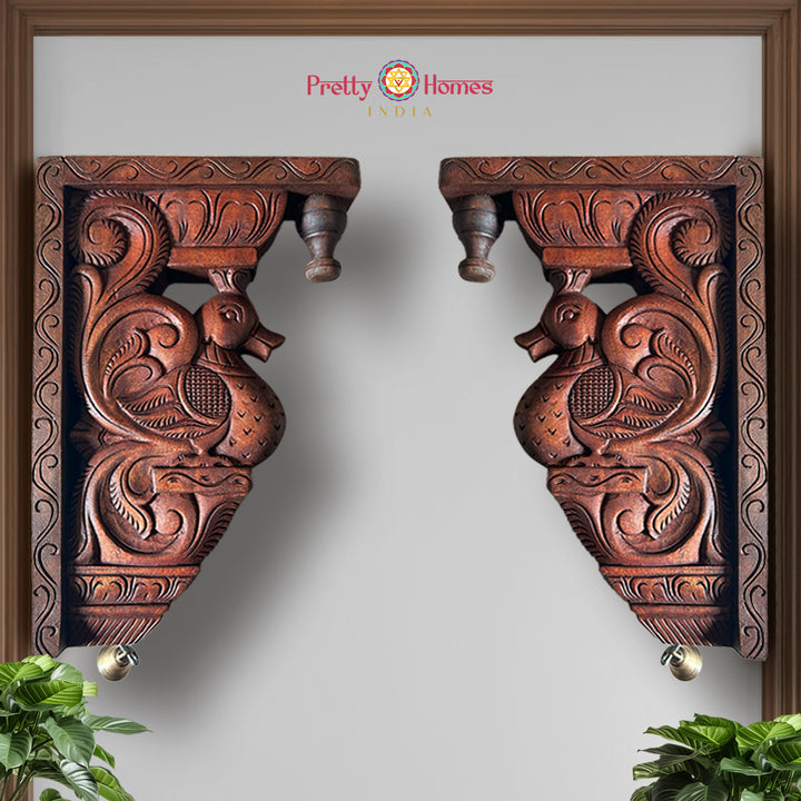 woodcarved lakshmi wall decor with lotus motifs and vibrant parrots