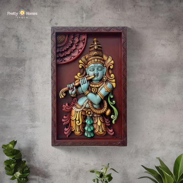 Front view of fluting Krishna wooden frame showing divine posture and detailed handcarved design