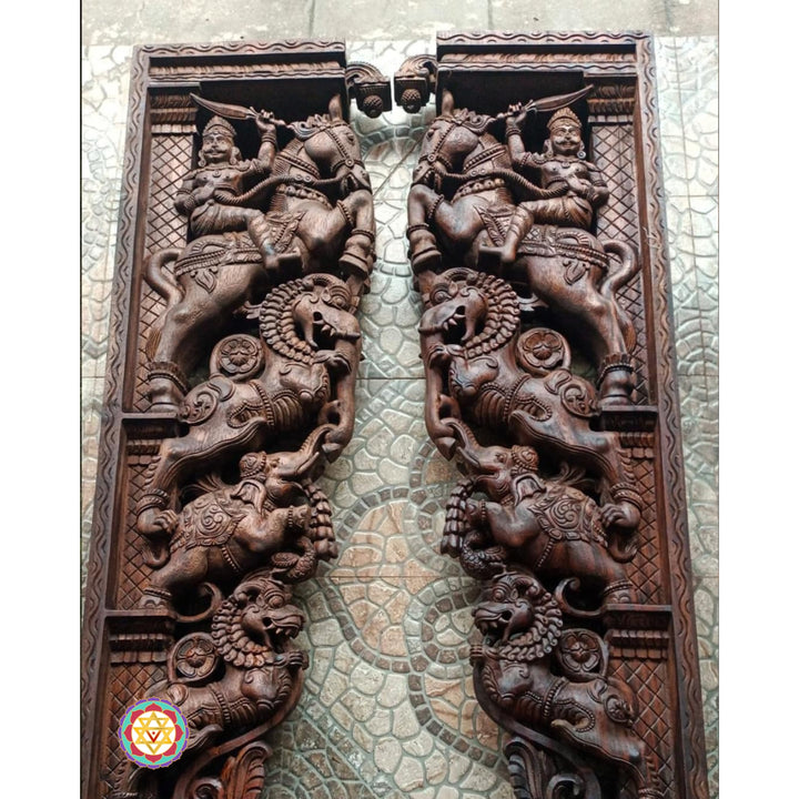 Front view of carved wooden wall brackets with detailed warrior and animal motifs — antique polish, temple-style architectural art