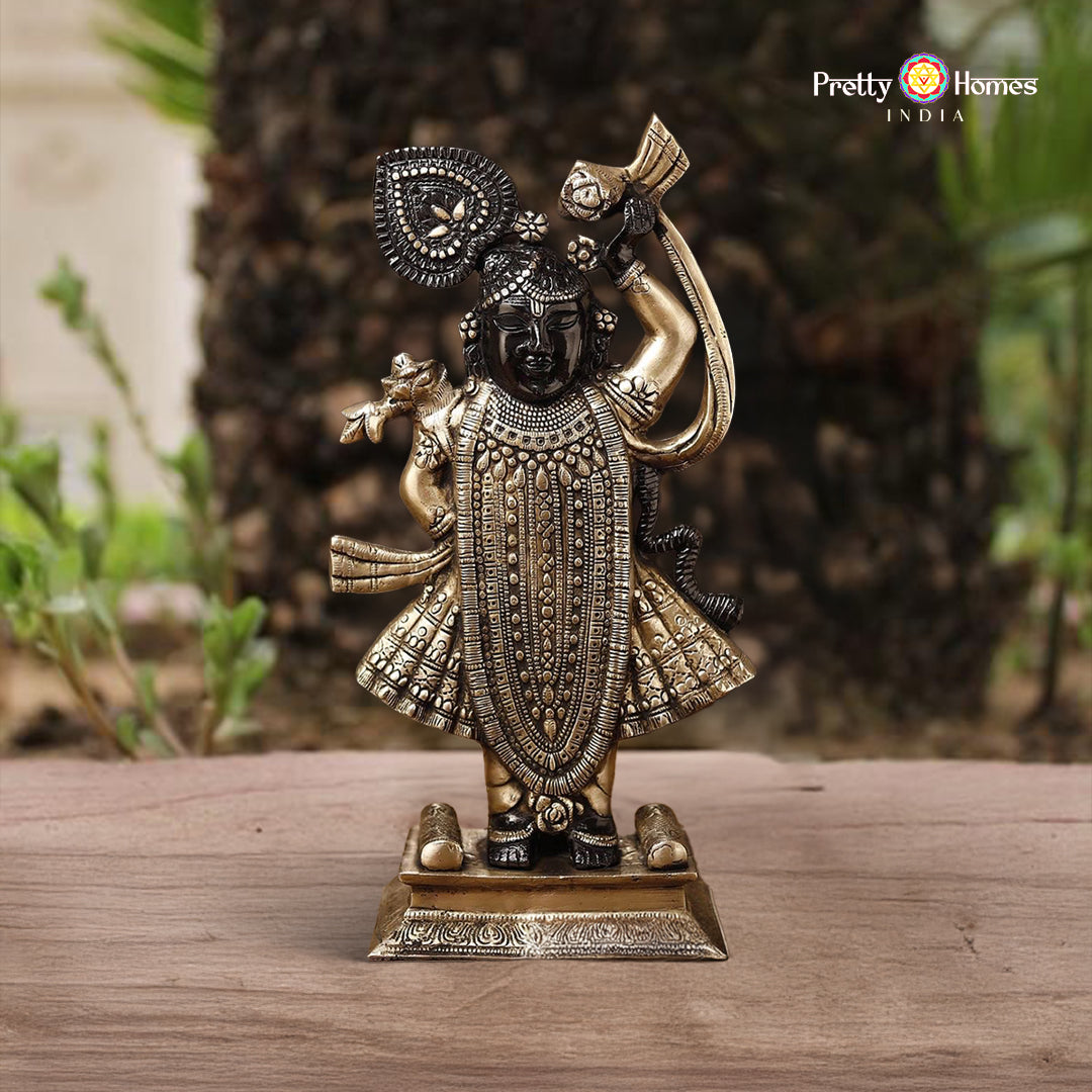 brass Shrinathji statue with golden and black patina detailing