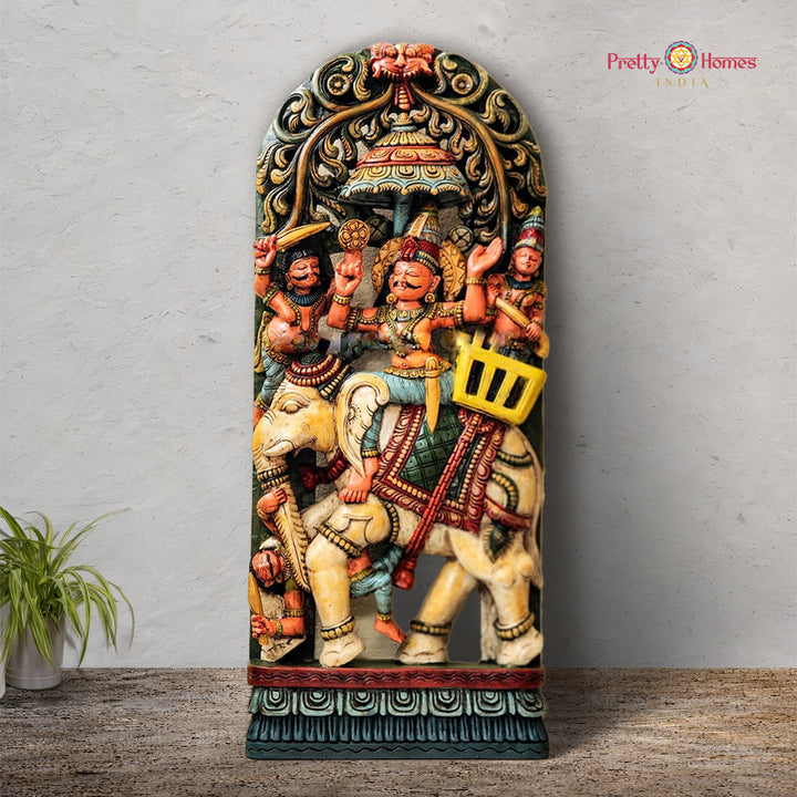 Vertical wooden panel with Indra seated on Airavata in carved teak wood