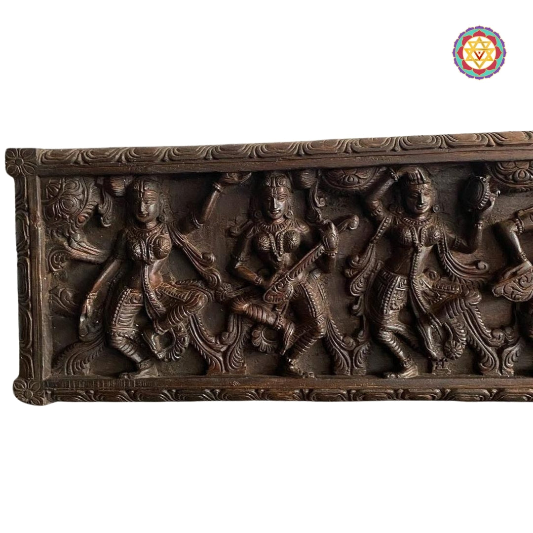 Wooden horizontal sculpture of Indian classical dancers