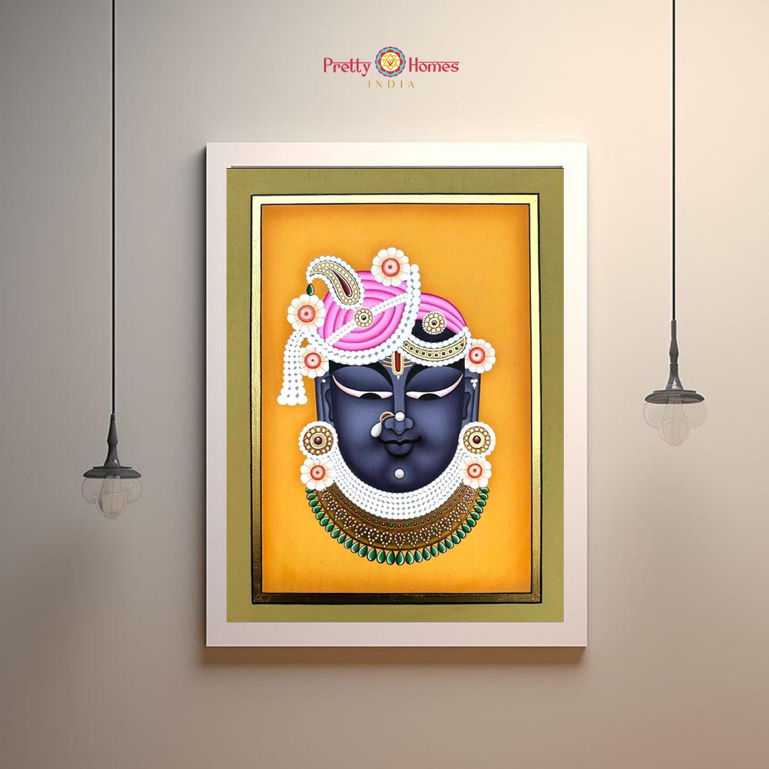 Front view of Shreenathji Mukharavind Pichwai painting showing divine face and floral golden detailing