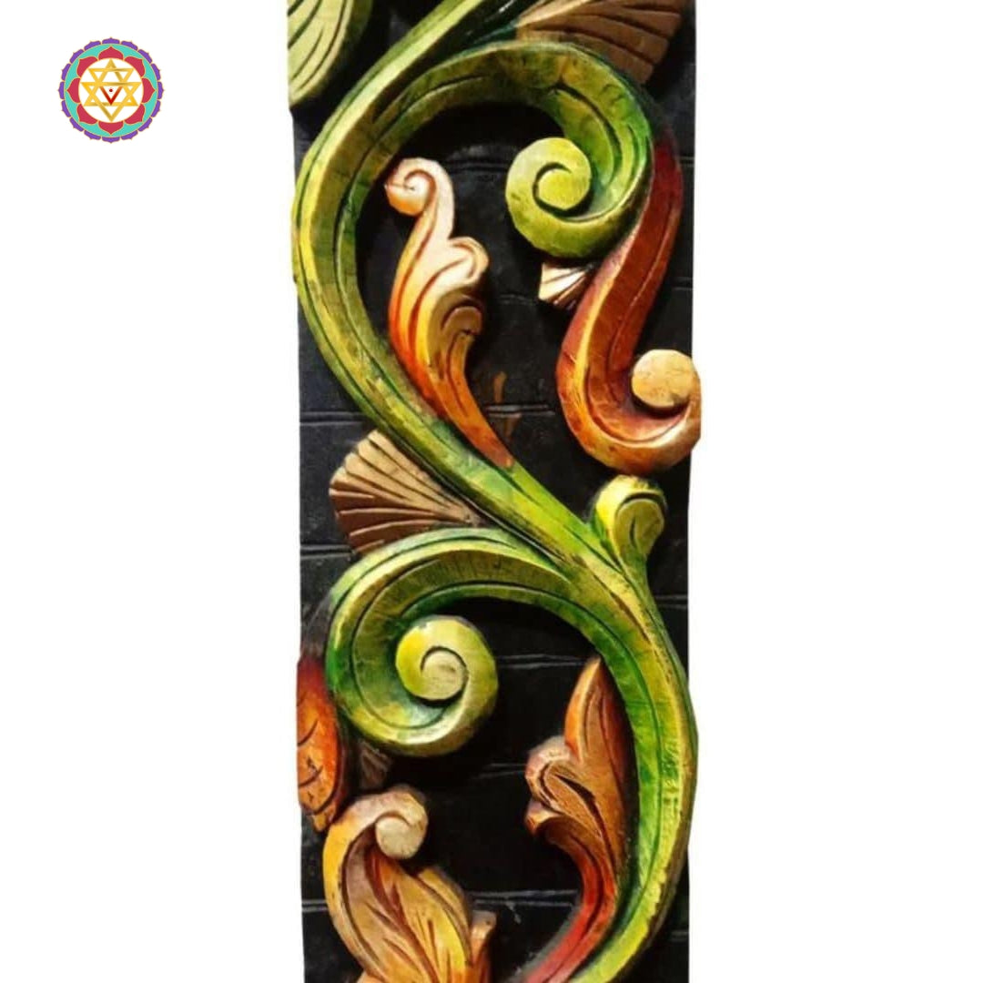 vertical wooden wall hanging with intricate floral carving design