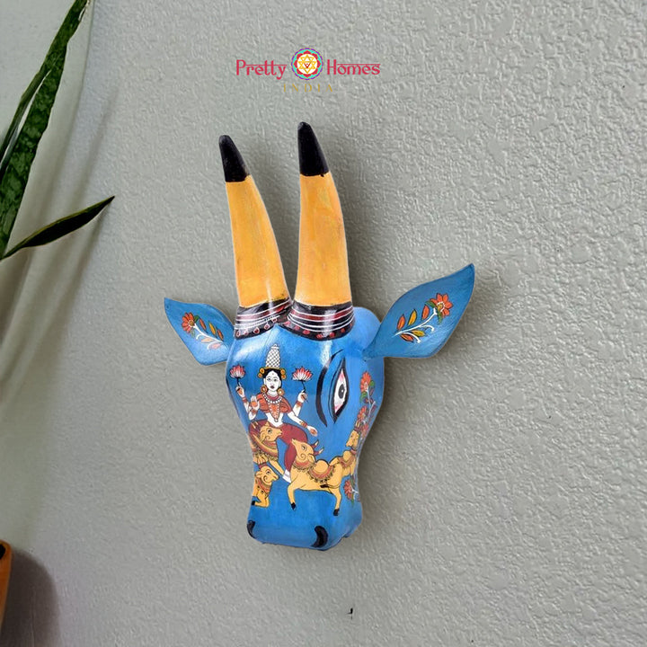 Hand-painted Nandi cow wall head featuring Goddess Laxmi motif