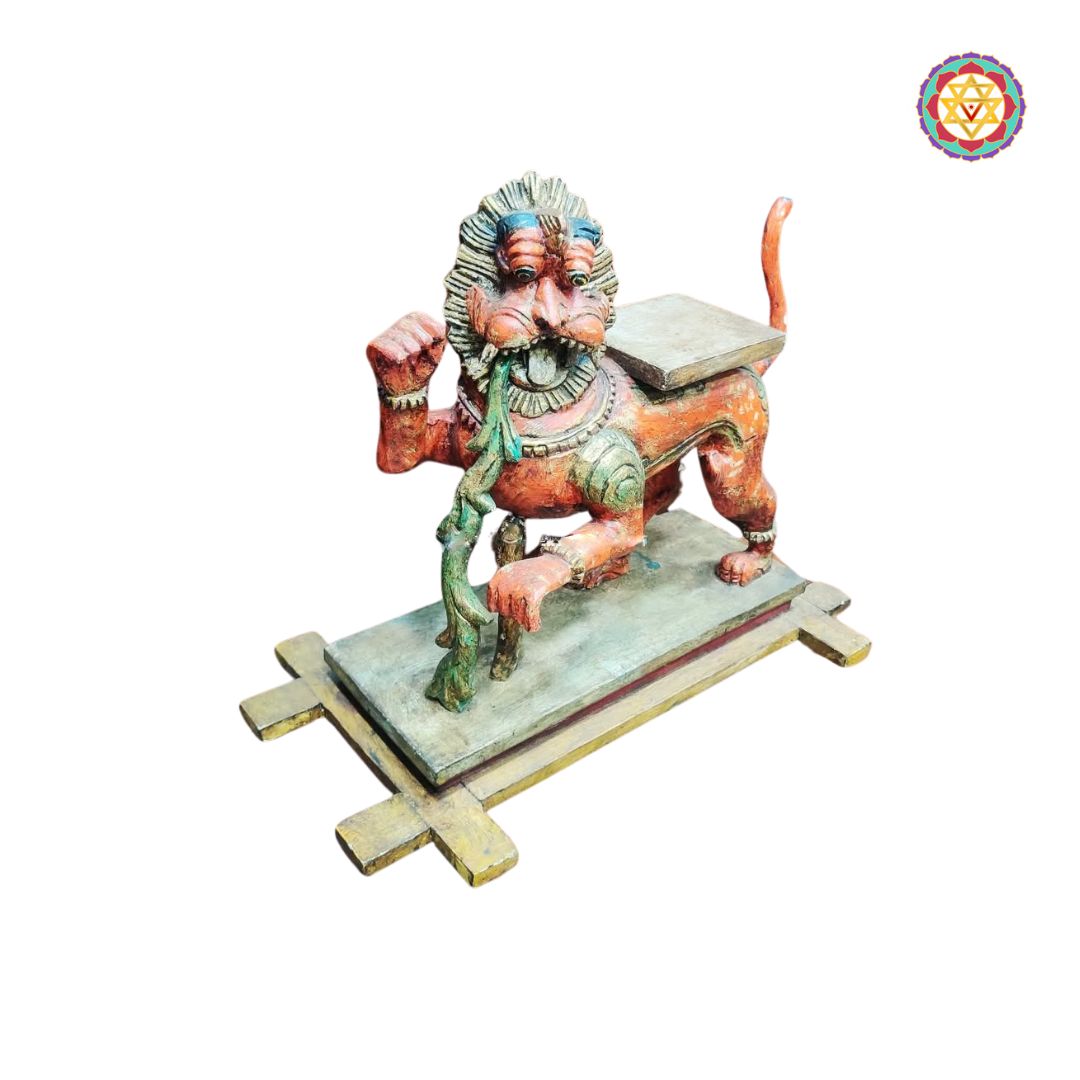 side angle of fierce yali wooden carving with detailed face