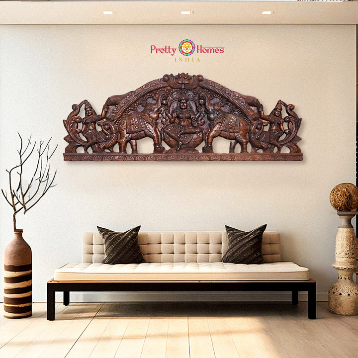 Horizontal Gajalakshmi wooden wall panel with lotus and elephants