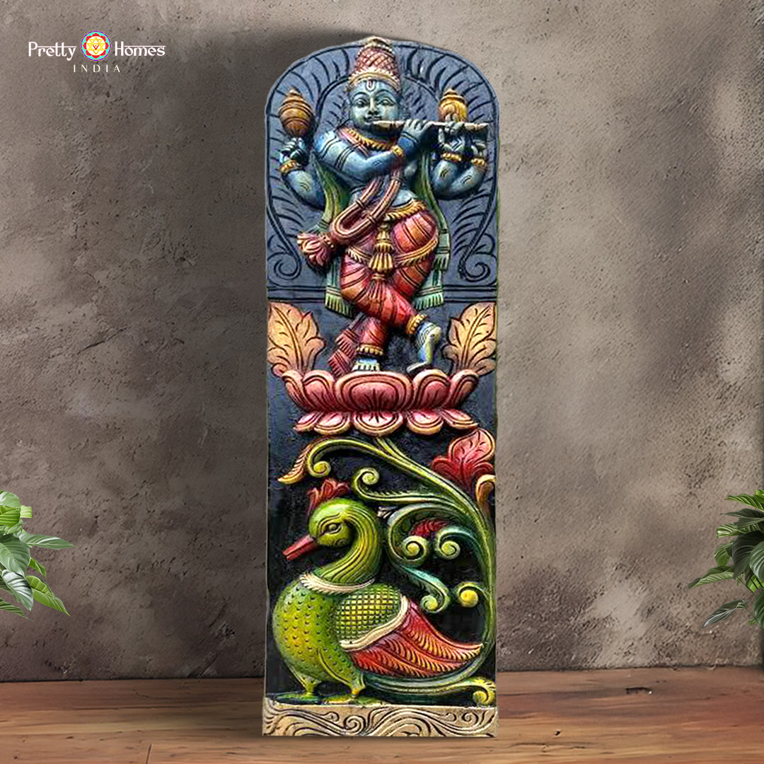 Vertical wood panel of flute-playing Krishna with Annapakshi bird in multicolour