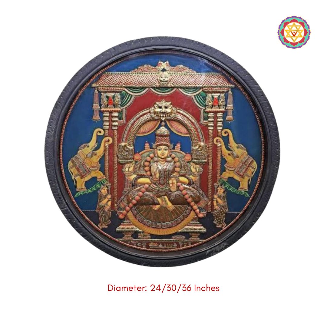 “Traditional Gajalakshmi Tanjore painting captured with rich texture and gold foil accents”