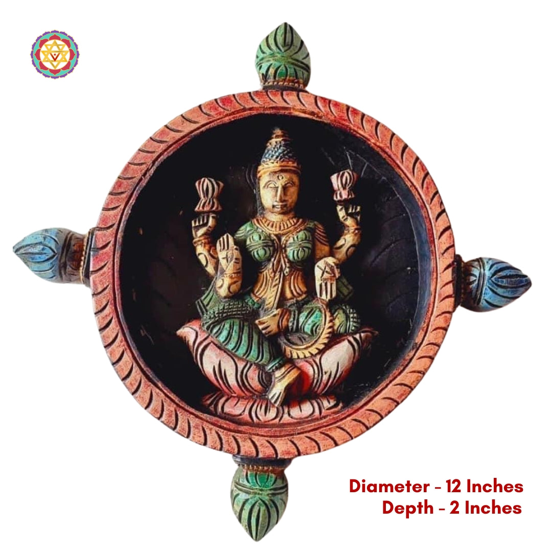Divine Lakshmi wood carving symbolizing wealth and grace