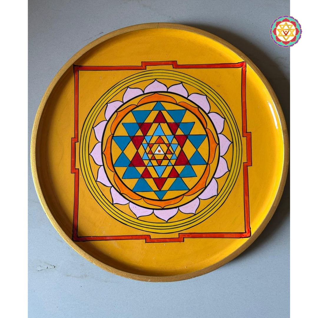 close-up of shree yantra wooden carving showing geometric detailing