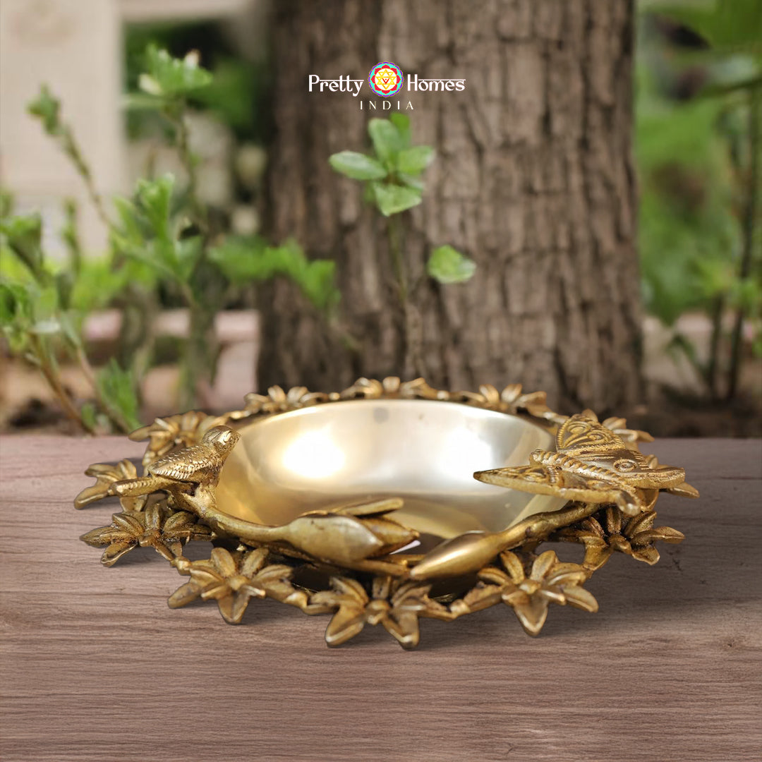 brass floral uruli tray with scalloped rim and elegant golden finish