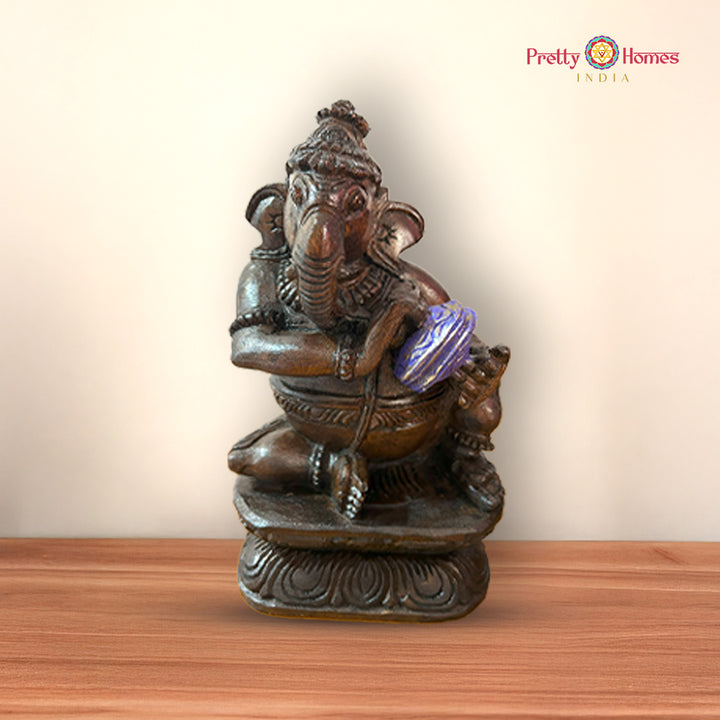The charming set of Lord Ganesh Holding Various Musical Instruments