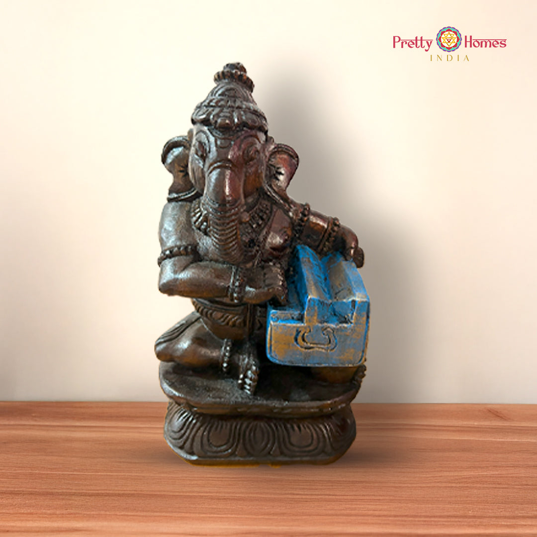 Individual Ganesh figurine with detailed facial expressions and musical pose