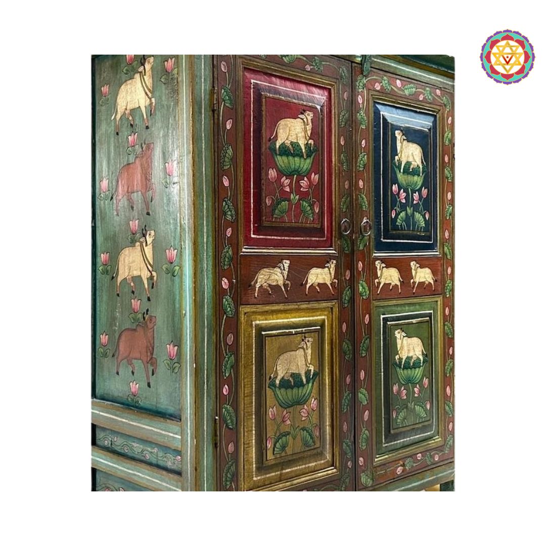 detailed hand-painted pichwai elements on storage cabinet