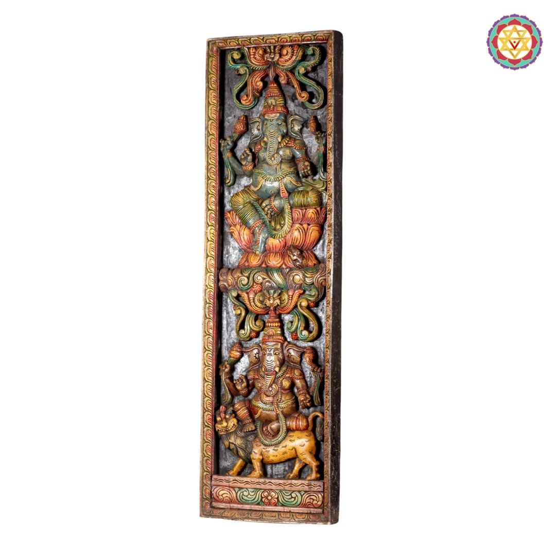 Lower section of Ganesha wooden panel showing deep relief carving