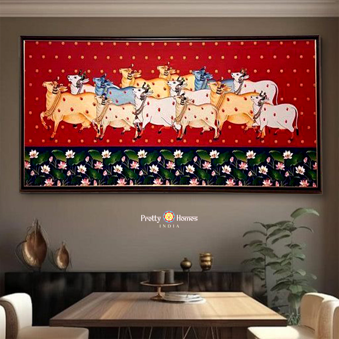 hand-painted pichwai cows with lotus on rust background wall plate, detailed brushwork and vibrant pigments