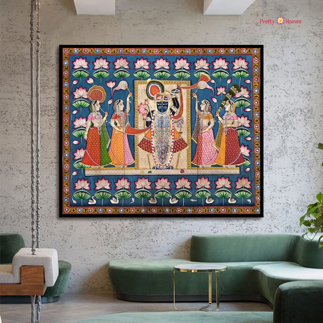Hand-painted pichwai Sharad Poornima painting with Shrinathji and Gopis, displayed in a living room.