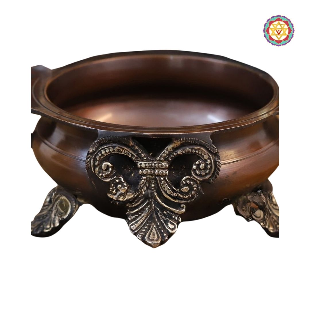 close-up of Ganesh figure on urli showing expressive detailing and polish