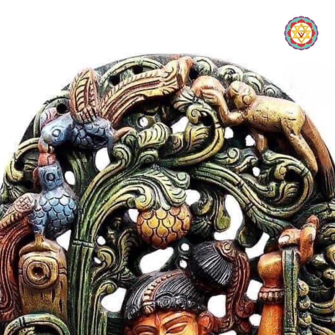 Close-up of Apsara sculpture showing graceful expression and carved jewelry details