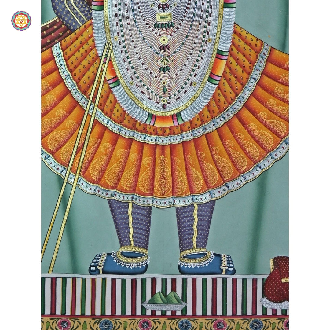 Close-up of Shrinathji Pichwai — intricate ornamentation and soft brushwork, artisan Indian temple art