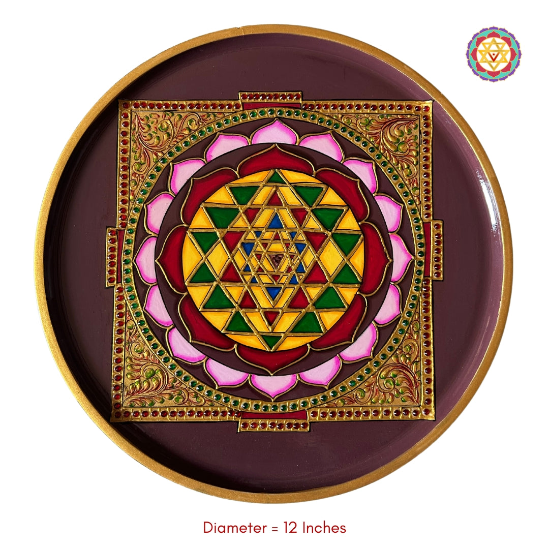 close-up of embossed yantra carving showing intricate geometric patterns