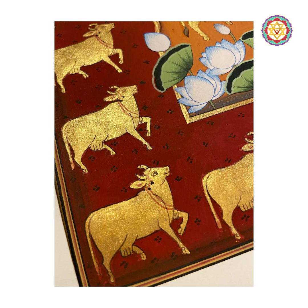 detailed section of golden cows and lotus motifs in traditional pichwai art style
