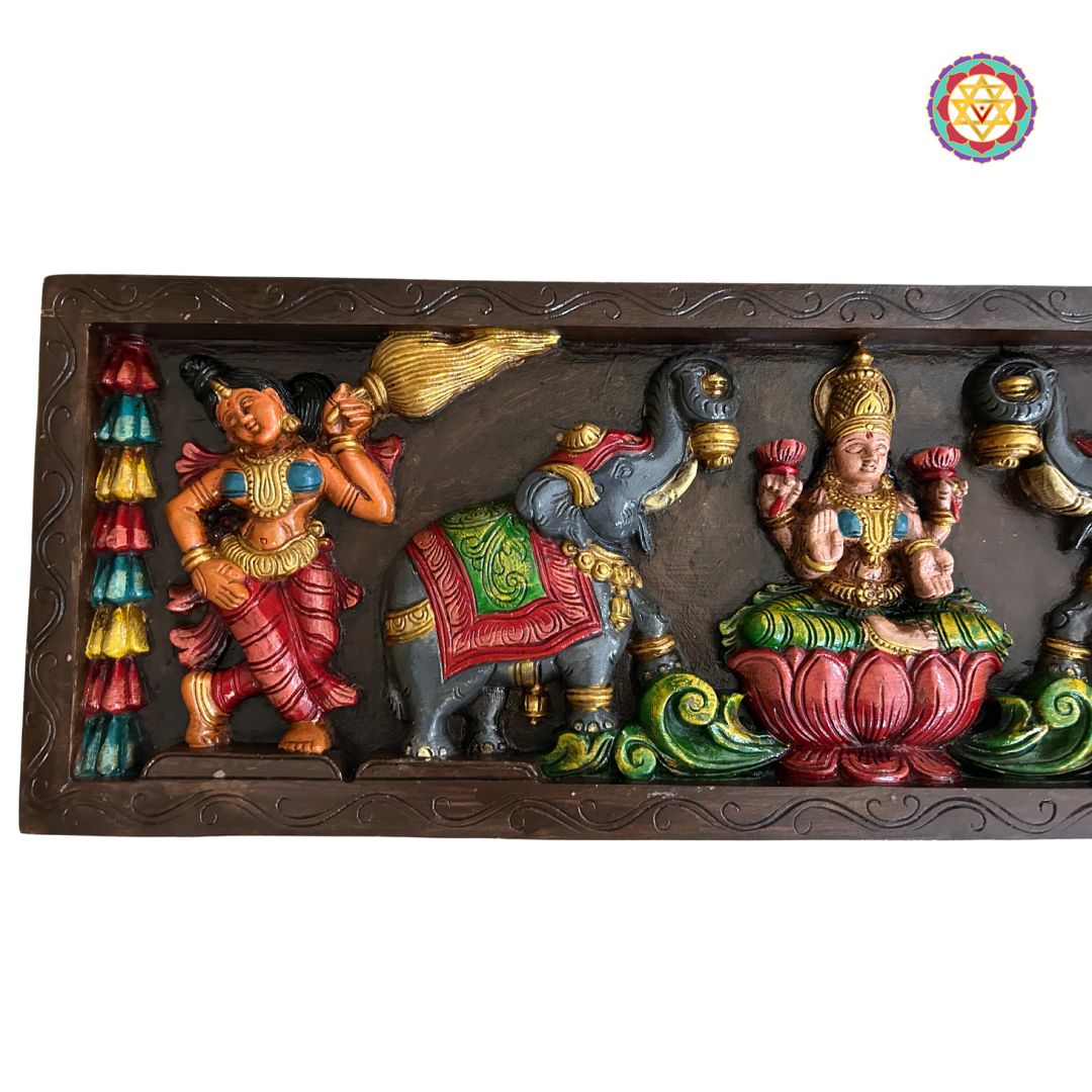 Front-facing panel of Gajalakshmi seated on lotus in blessing pose