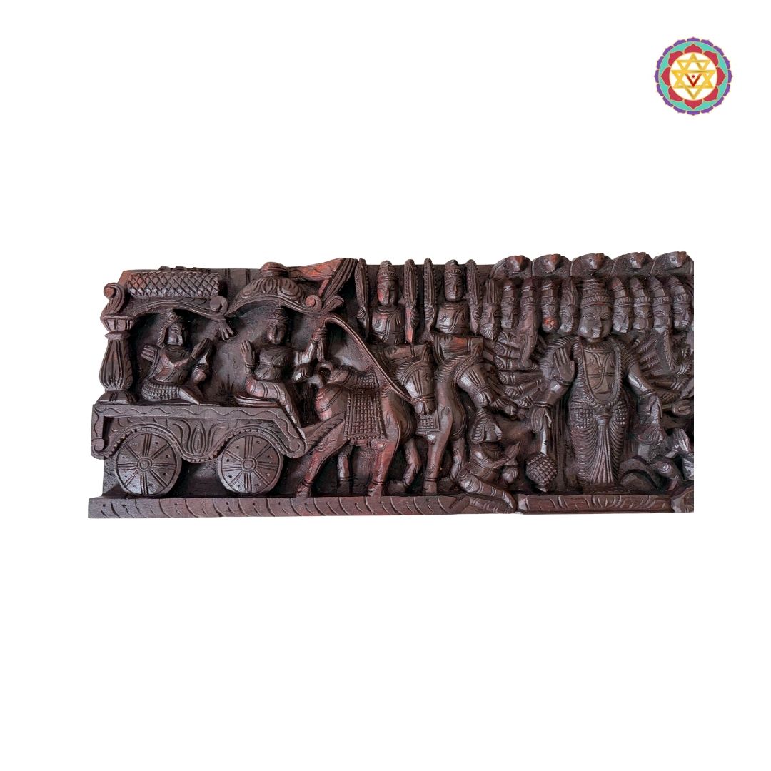 Intricately woodcarved horizontal panel depicting Lord Mahavishnu as Krishna guiding Arjun on a chariot.