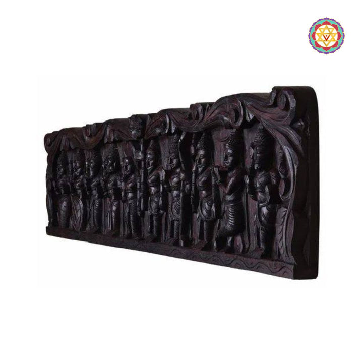 Close-up of Vishnu avatars on horizontal wooden wall panels