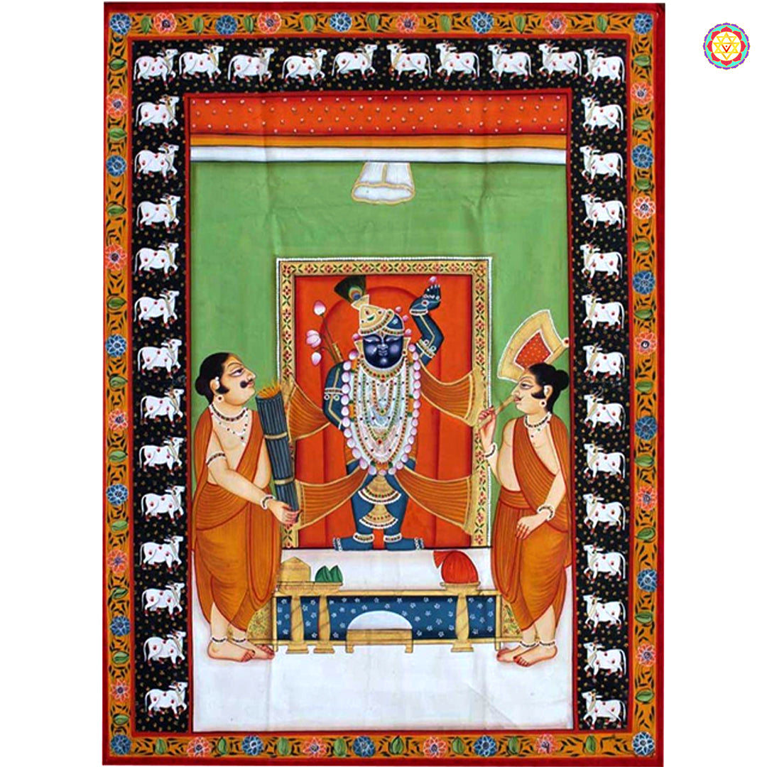 Hand painted Pichwai Shrinathji wall art with attendants, ornate jewelry and cow motif border