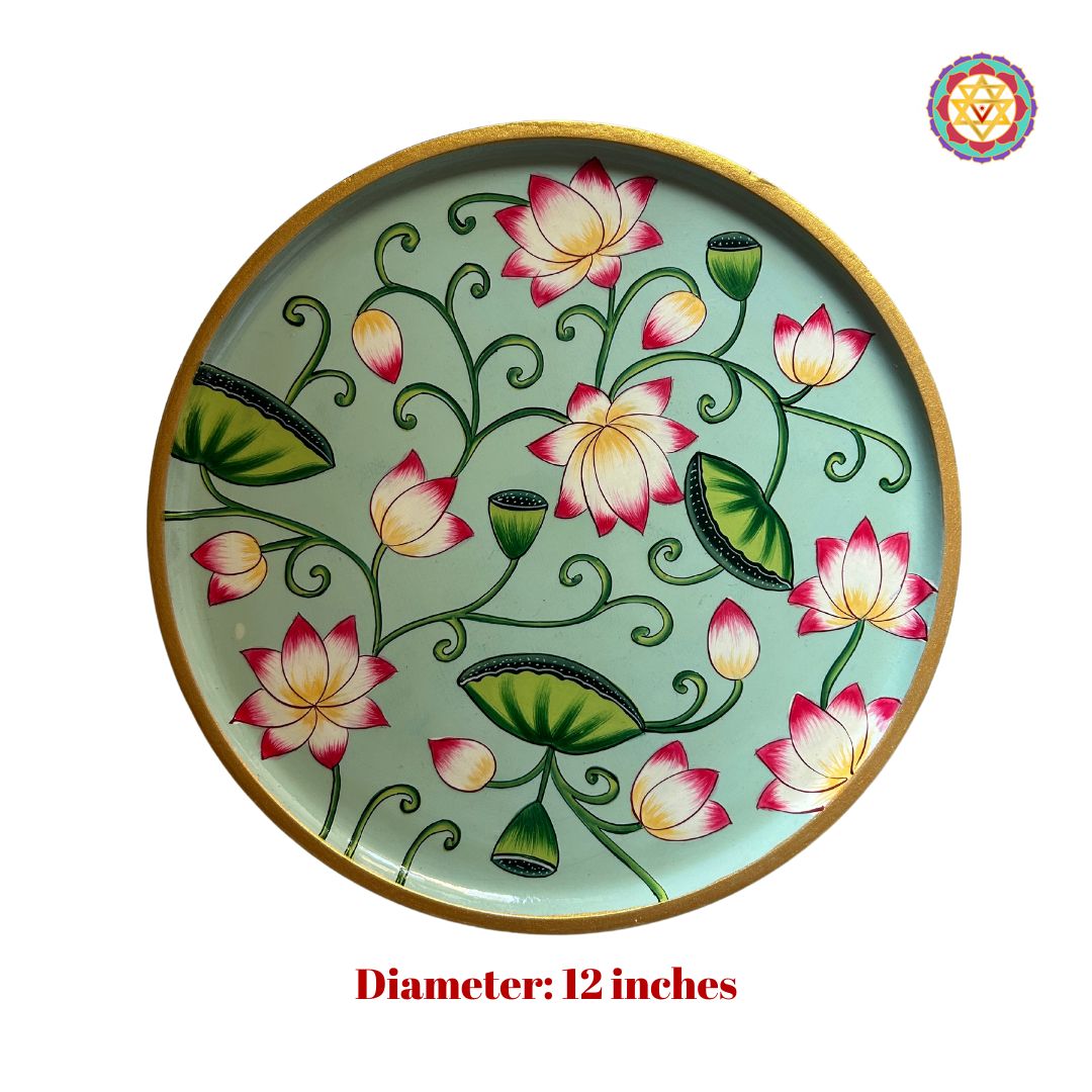Hand painted wall plate featuring lotuses and leaves, pichwai design
