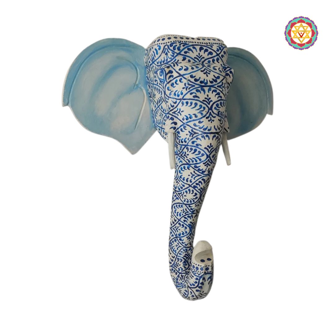 Side view of traditional elephant sculpture in carved wooden design