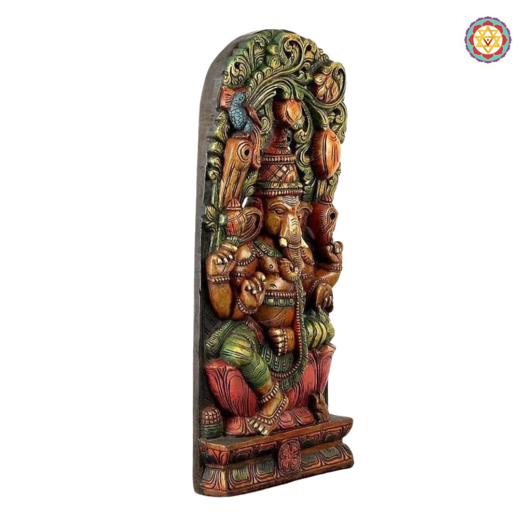 Rear view of canopy Ganesha statue — carved wooden structure and fine polish detailing