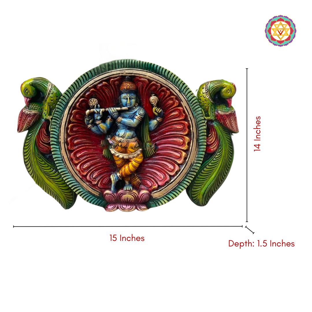 close up of carved krishna with parrots in circular wooden panel