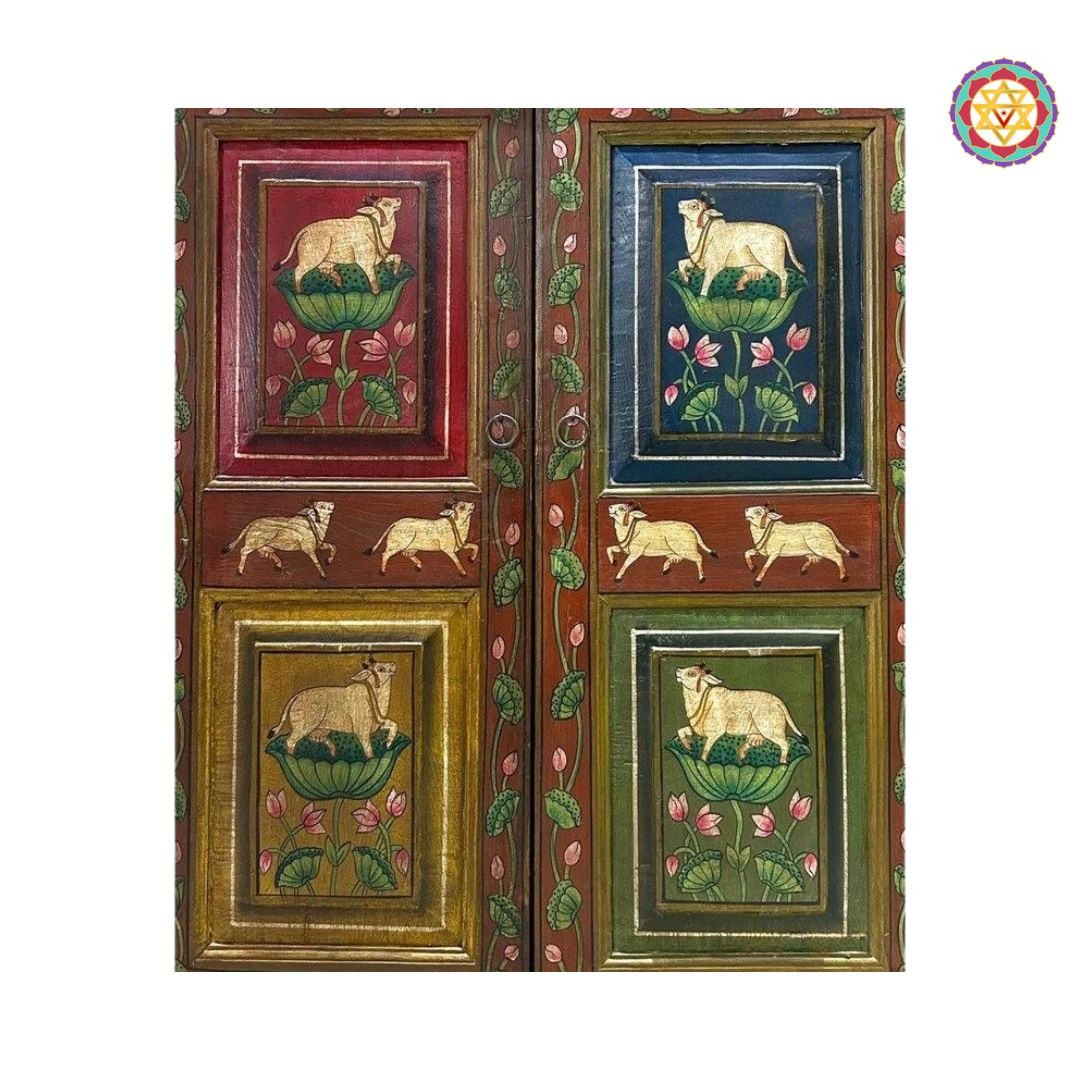 traditional pichwai cows and lotus motifs on wooden cabinet