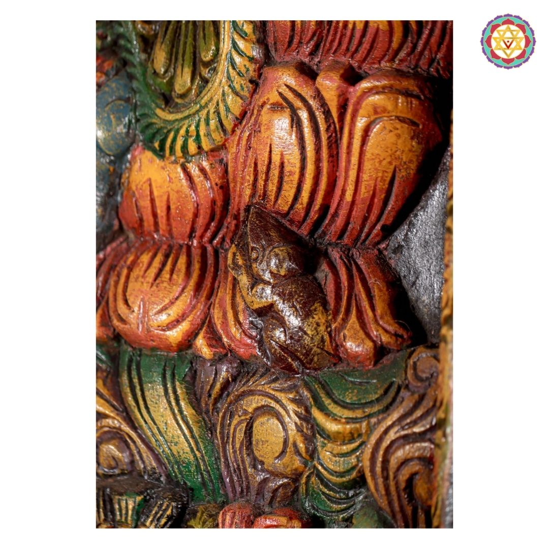 Close up of yali carved on Ganesha wooden panel