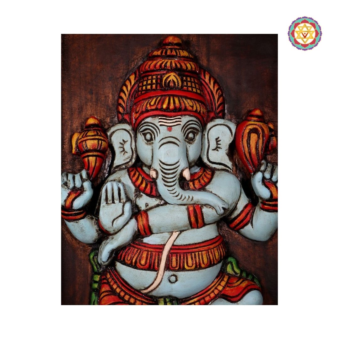 wood carved dancing ganesha frame mount angled view showing depth of carving and texture