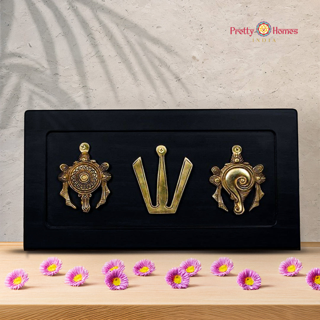 Brass Vishnu symbols framed on wood — handcrafted Indian wall décor