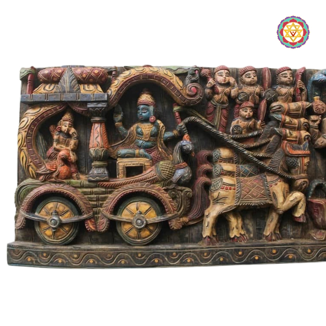 Detailed chariot wheels and horses carved on Krishna Arjuna panel