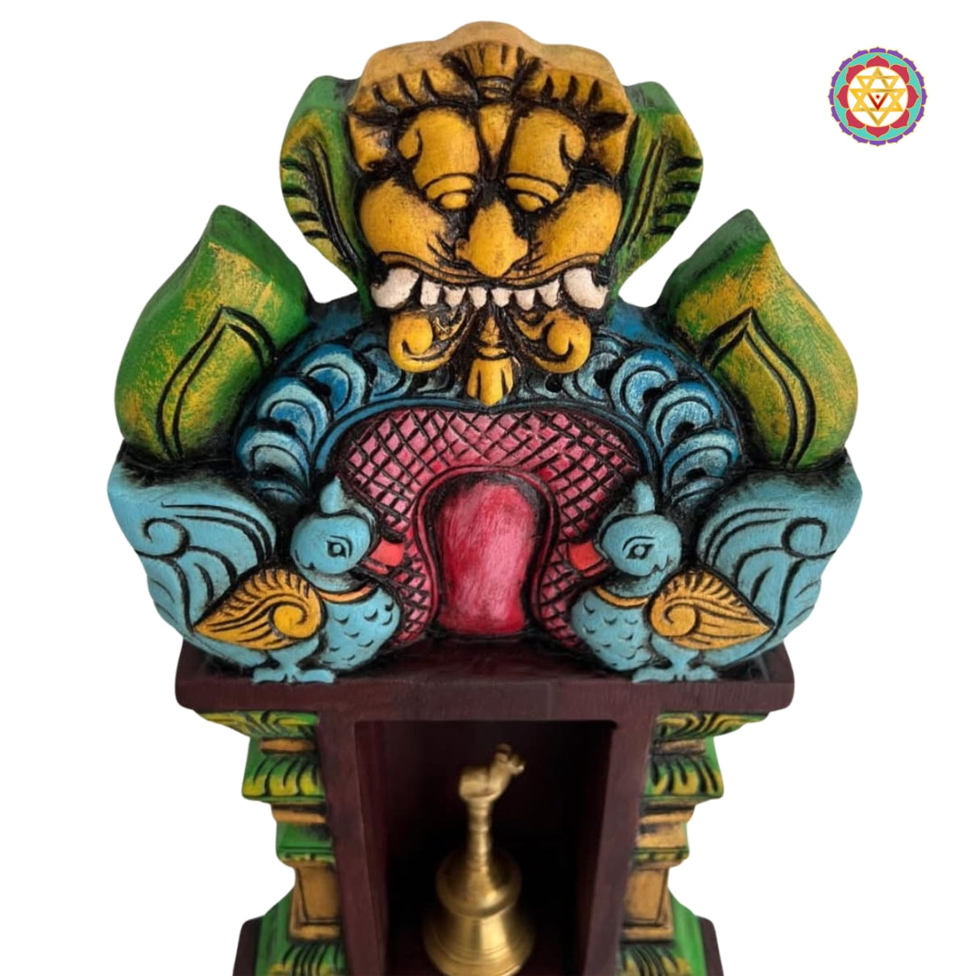 hand-carved wooden pooja shelf with traditional temple design