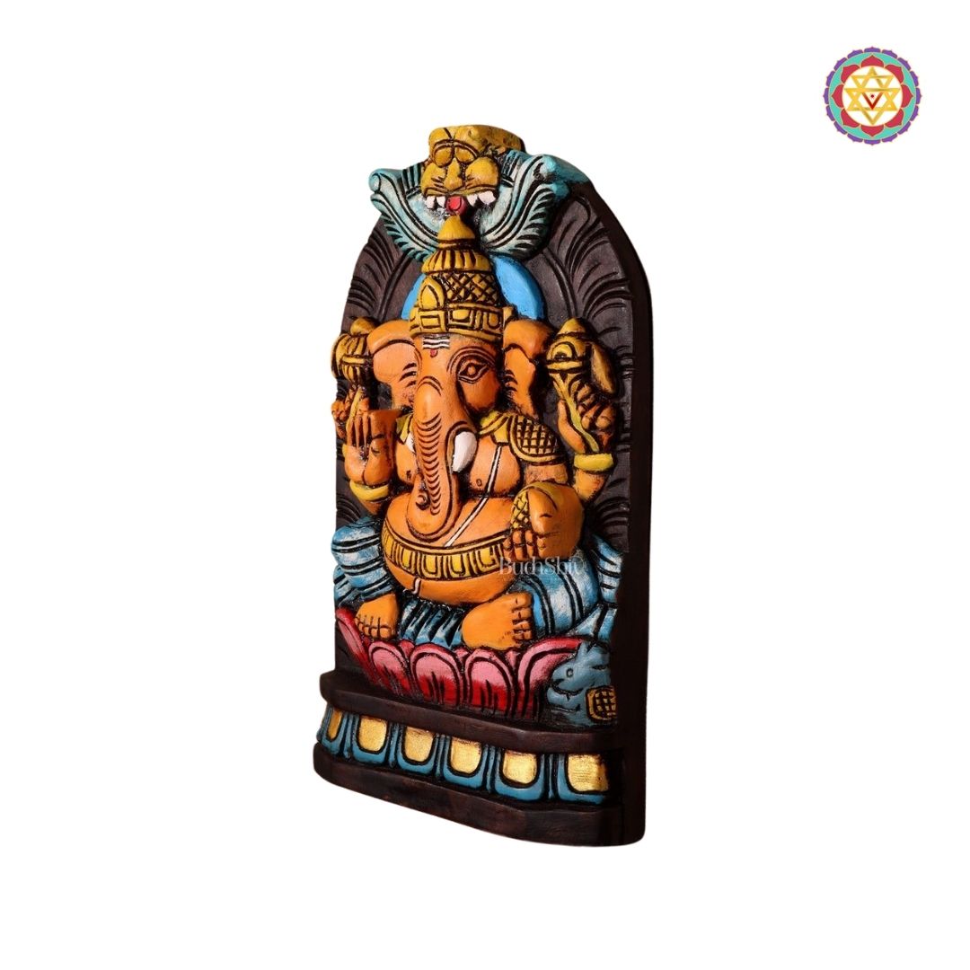 Side-angle showing elephant carvings and kalash detailing