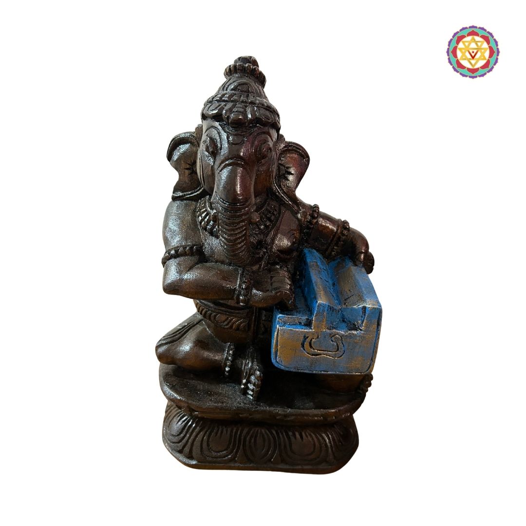 Group display of musical Ganesh figurines symbolizing art and devotion