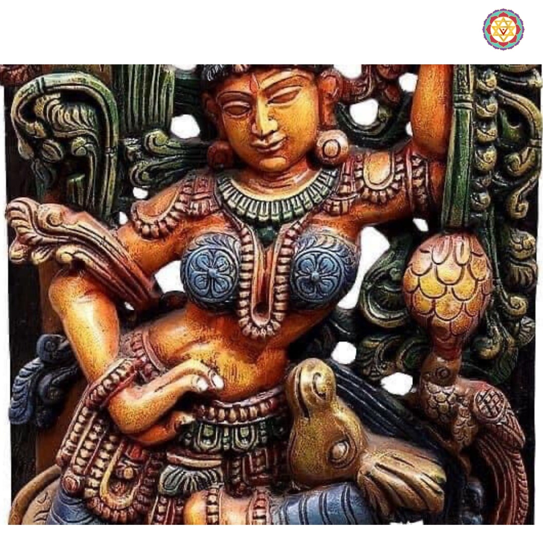 Angled view of Apsara statue showing floral carvings and vibrant multicolor finish
