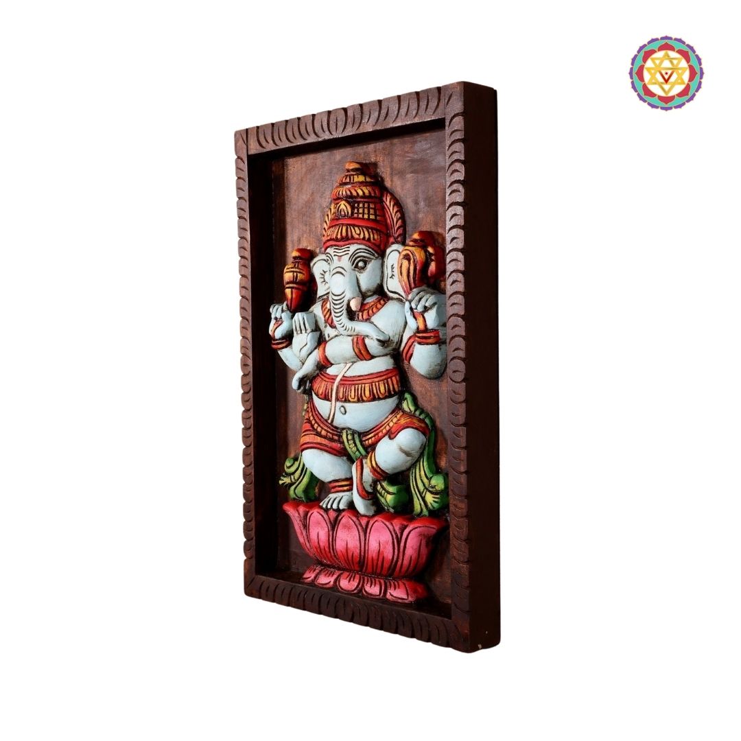 wood carved dancing ganesha frame mount detailed shot of facial carving and ornamentation