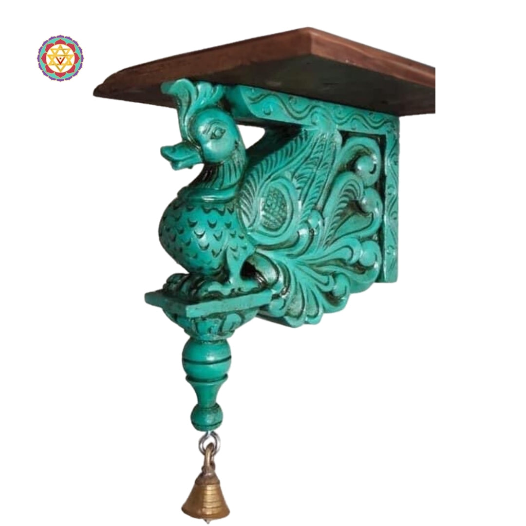 Fine carving detail of annam swan bracket showing floral vines and ornate traditional motifs