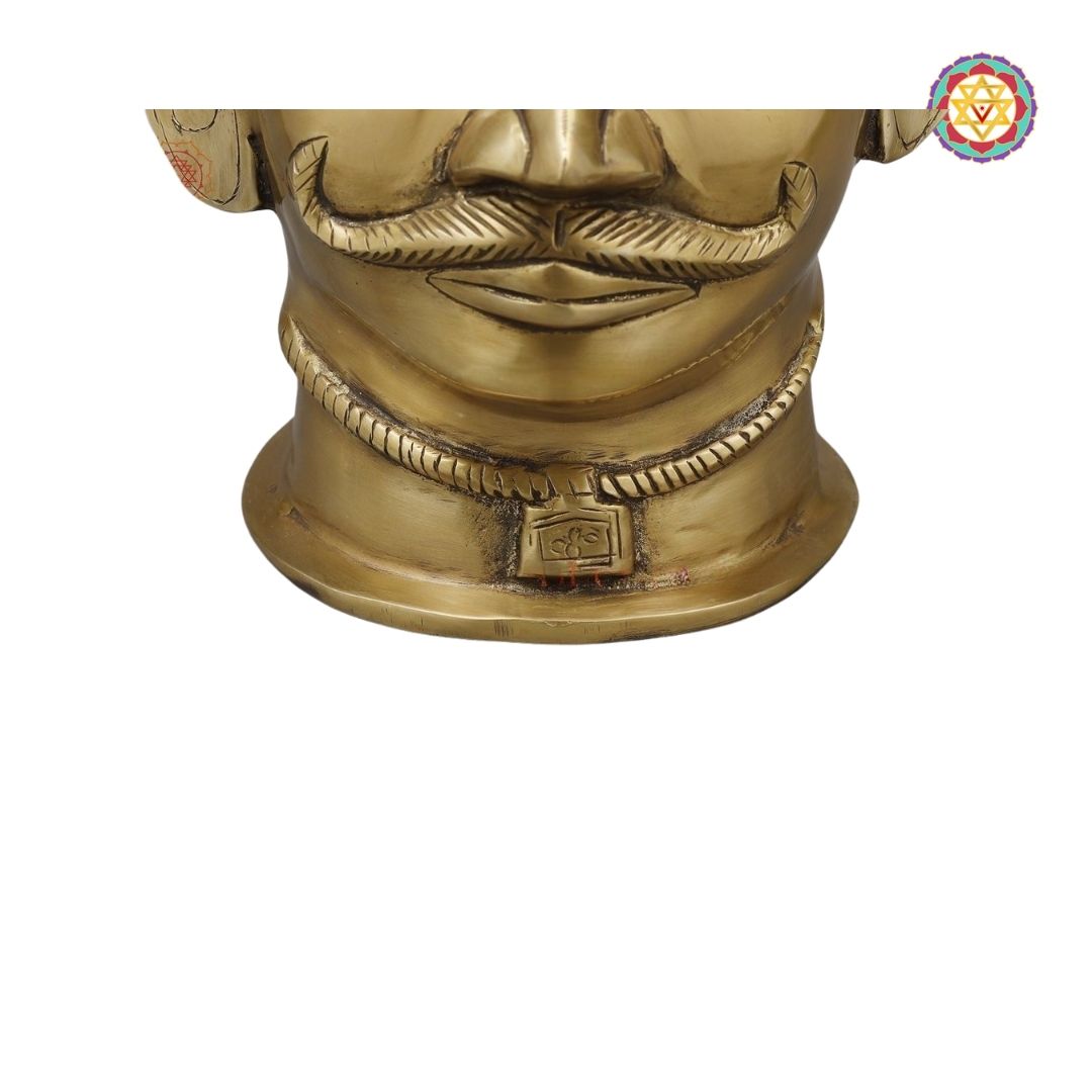 rear view of brass Shiva mask displaying surface texture