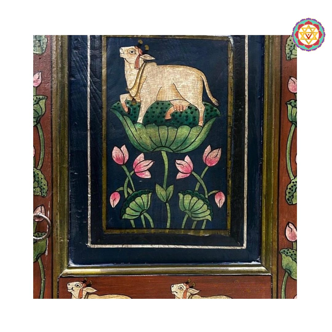 multicolour pichwai artwork on handcrafted side cabinet